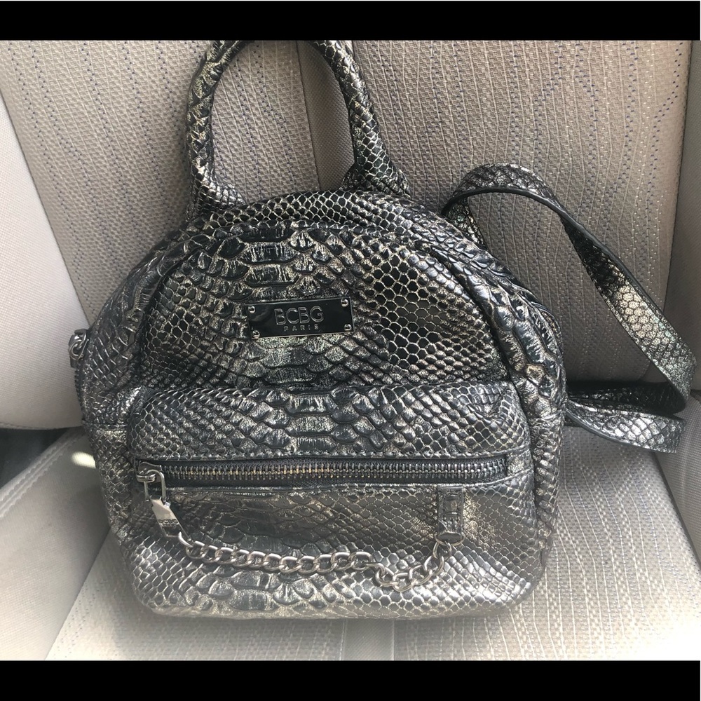 New BCBG pewter snakeskin back pack purse
